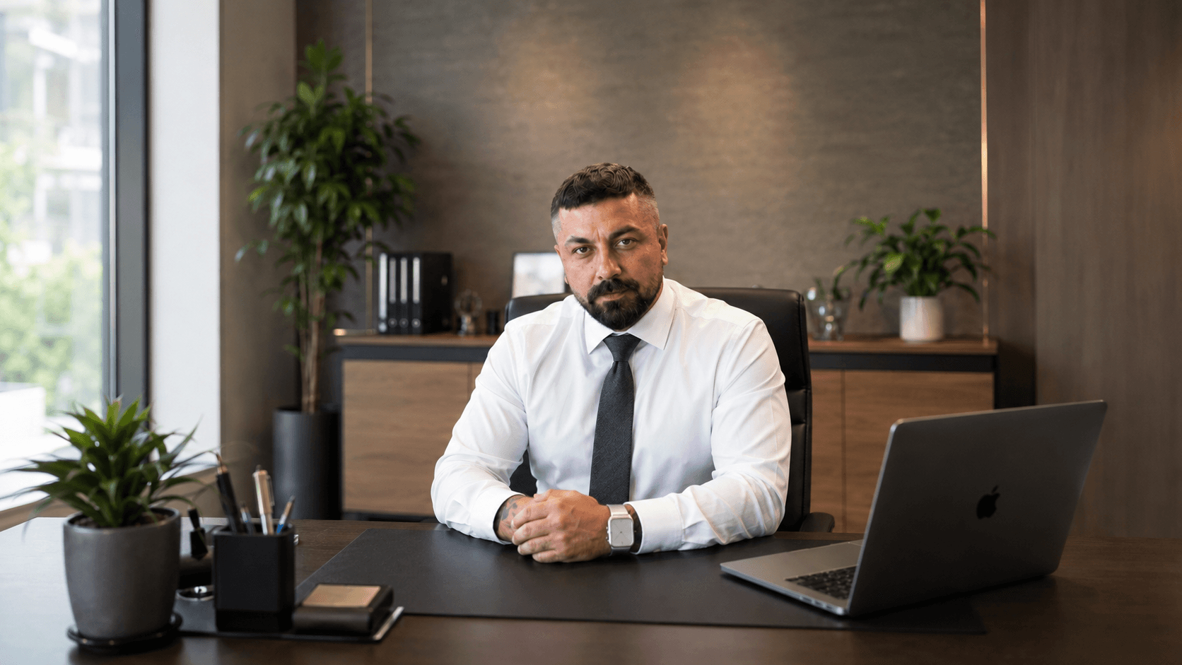 The founder at his desk